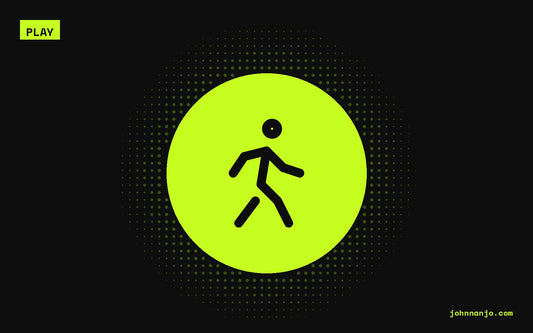 A walking person icon for a JOHN NANJO Tokyo guide